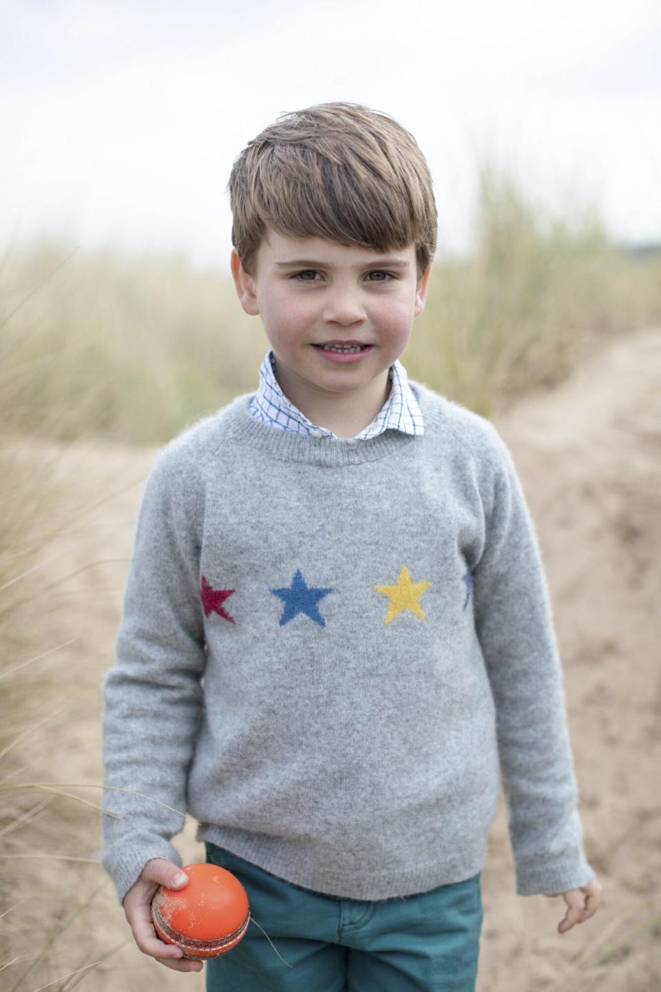 Prince Louis of Cambridge posing for a photograph, taken by his mother, Britain's Catherine, Duchess of Cambridge, in Norfolk, eastern England 4th Birthday Portraits