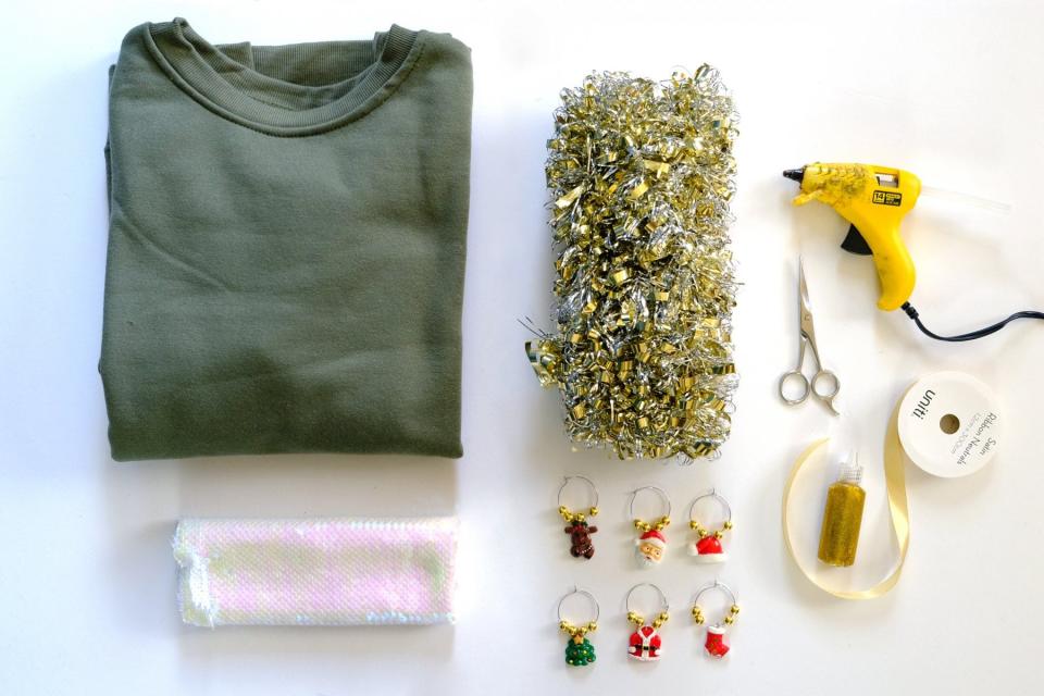 All supplies you'll need to create a DIY holiday sweater.