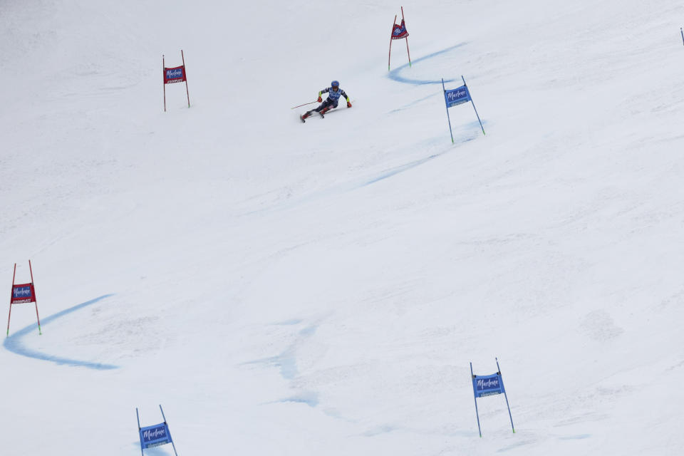 United States' Mikaela Shiffrin speeds down the course on her way to win an alpine ski, women's World Cup giant slalom, in Kronplatz, Italy, Tuesday, Jan. 24, 2023. American skier Mikaela Shiffrin won a record 83rd World Cup race Tuesday. Shiffrin's giant slalom victory broke a tie on the all-time women's list with former American teammate Lindsey Vonn. (AP Photo/Alessandro Trovati)