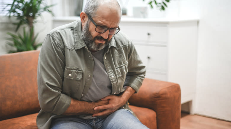 A man experiencing stomach pain