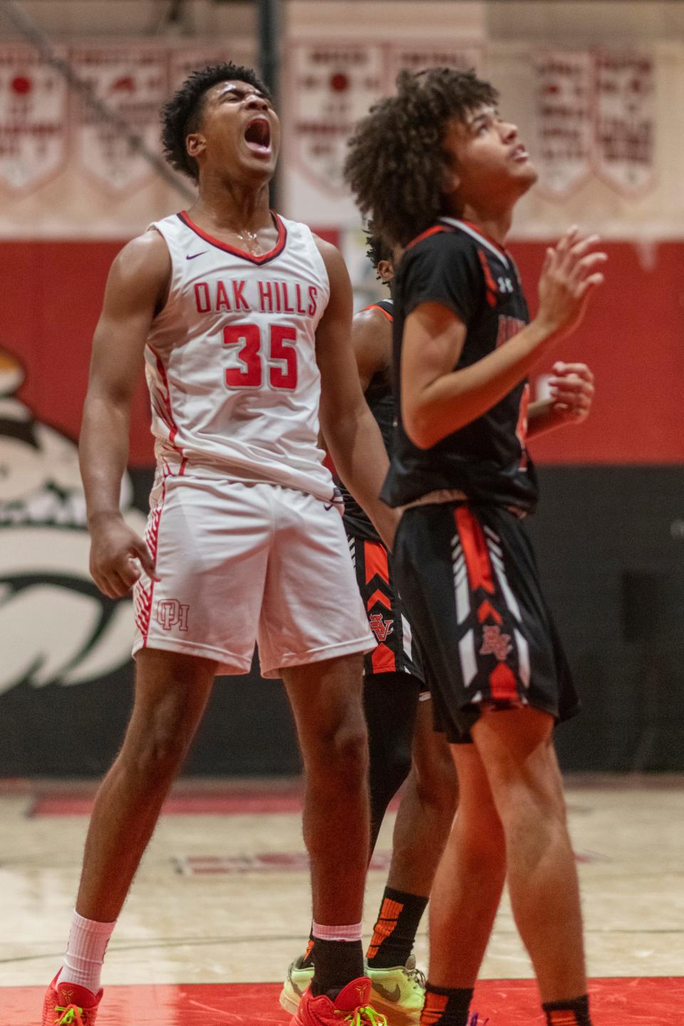 Oak Hills’ Jeremiah Lark celebrates after scoring against Apple Valley on Wednesday, Jan. 3, 2024. Oak Hills won 74-28 in the Mojave River League opener.