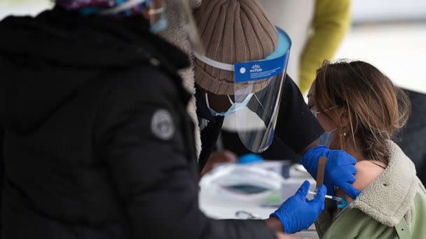 PHOTO: In this Nov. 29, 2021, file photo, a person gets a Covid-19 vaccination at an outdoor walk-up vaccination site within Franklin Park in Washington, D.C. (Jim Watson/AFP via Getty Images, FILE)