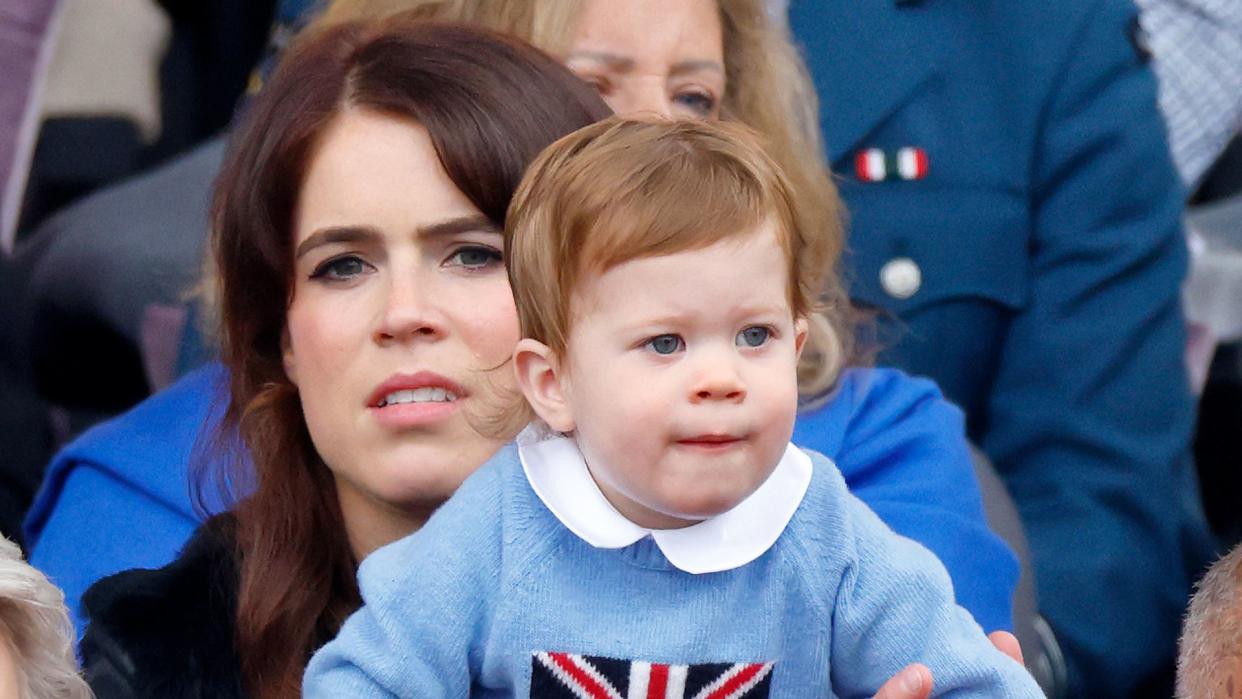 Princess Eugenie holding August Brooksbank