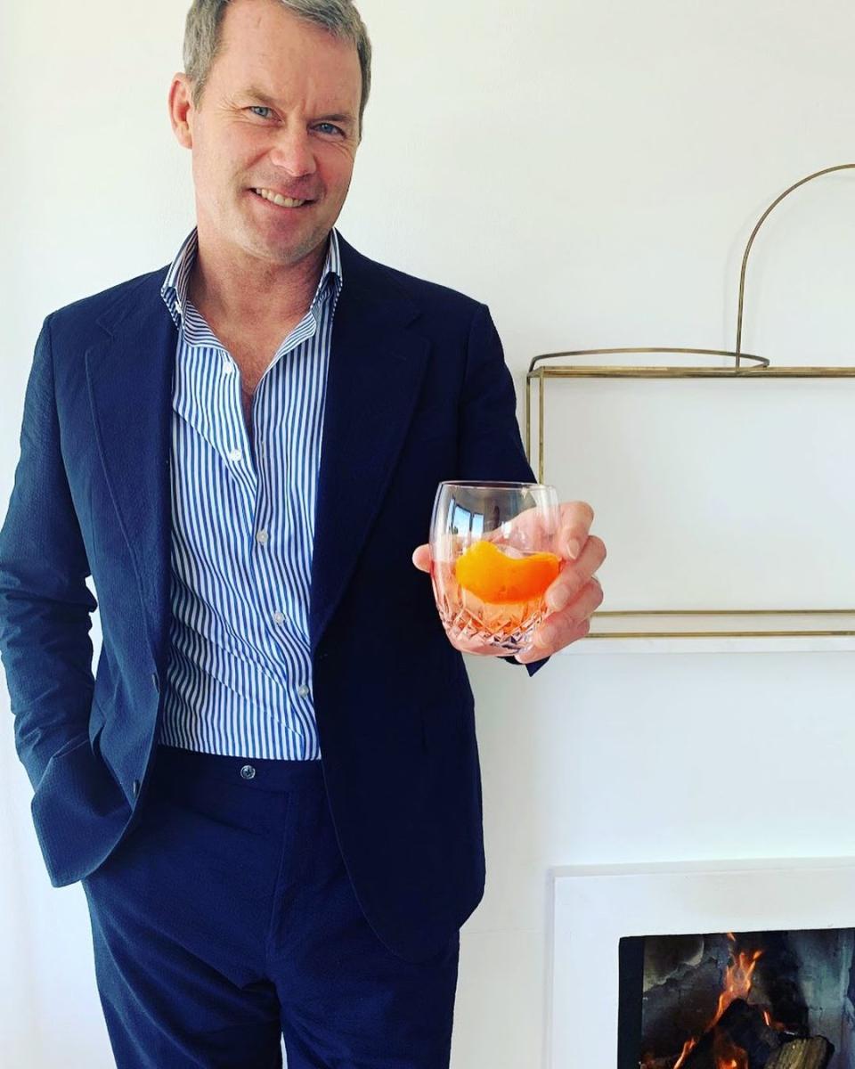 Tom Williams drinking a cocktail