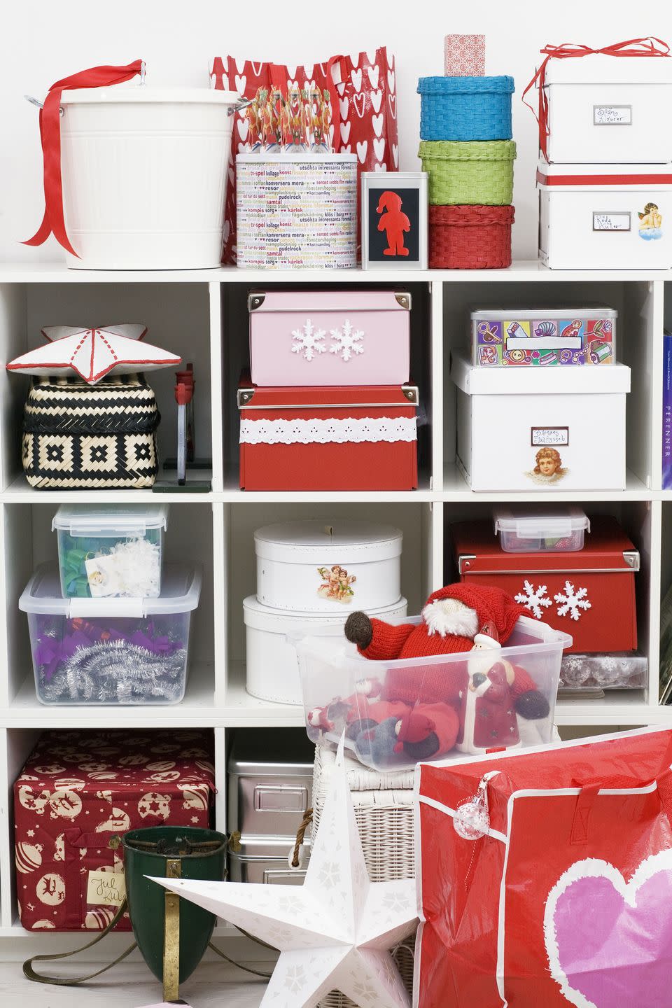 <p>Tackle the challenge of finding a home for presents and special Christmas items by operating one simple rule: store 'like with like'. Keep all decorations in one place – attic, garage, loft – labelled for ease next year. Organise children's rooms so similar toys and games are stored together, likewise scarves, jewellery, socks and underwear.</p><p><strong><span class="redactor-invisible-space">Read more: <a href="https://www.housebeautiful.com/uk/lifestyle/storage/a35080849/organising-storage-christmas-decorations-clea-joanna-home-edit/" rel="nofollow noopener" target="_blank" data-ylk="slk:The one thing you should do before you pack away your Christmas decorations;elm:context_link;itc:0;sec:content-canvas" class="link ">The one thing you should do before you pack away your Christmas decorations</a></span></strong></p>