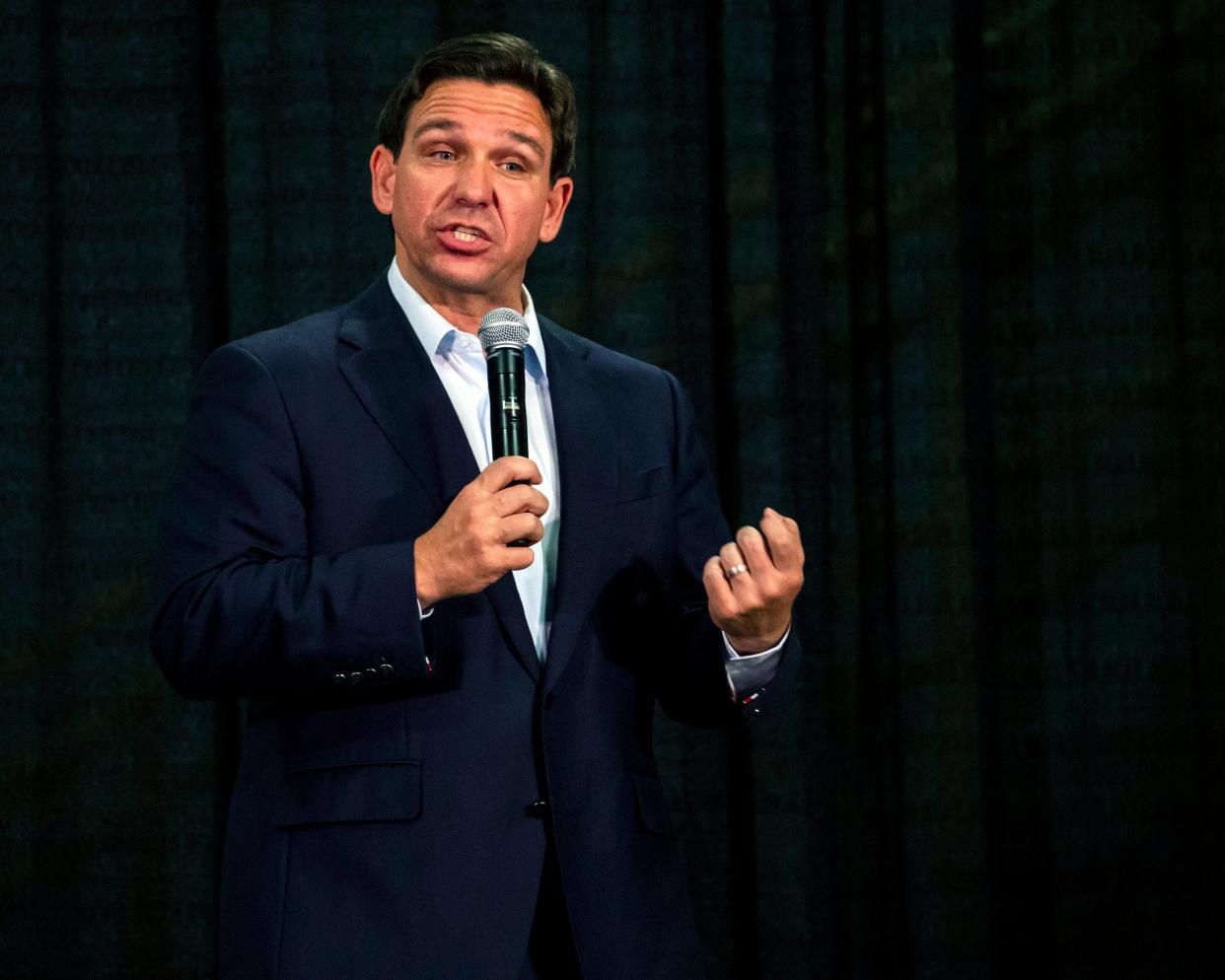 Florida Gov. Ron DeSantis speaks during U.S. Rep. Mariannette Miller-Meeks', R-Iowa, Triple MMM Tailgate event in Iowa City, Iowa on Friday, Oct. 20, 2023. The event featured remarks from several candidates for the Republican Party's nomination for President. (Nick Rohlman/The Gazette via AP)