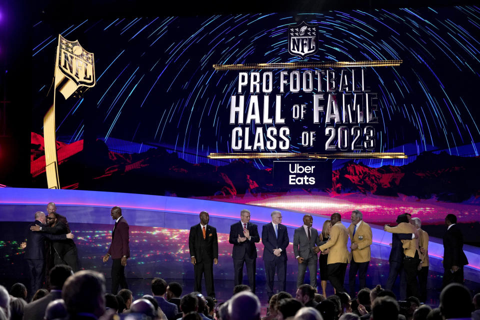 The Pro football Hall of Fame class of 2023 poses during the NFL Honors award show ahead of the Super Bowl 57 football game,Thursday, Feb. 9, 2023, in Phoenix. (AP Photo/David J. Phillip)
