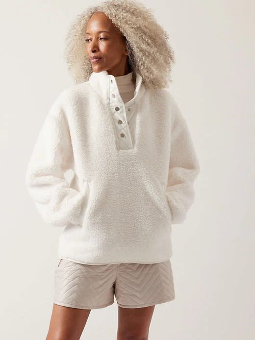 Cozy Sherpa Snap Sweatshirt. Image via Athleta.