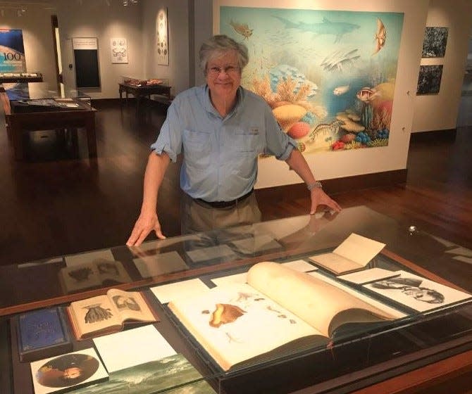 UGA Professor Emeritus James Porter poses in the 'Sunken Treasure' exhibit that opens soon on the UGA campus.