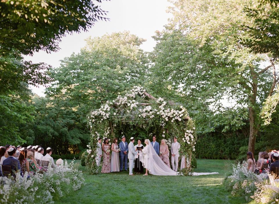 Our chuppah was covered in overgrown ivy and garden roses.