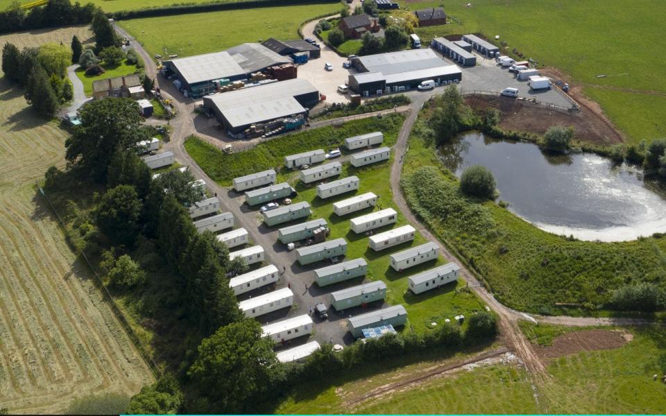 An aerial view of the farm shows mobile homes where 200 workers are under quarantine  - Getty Images Europe 