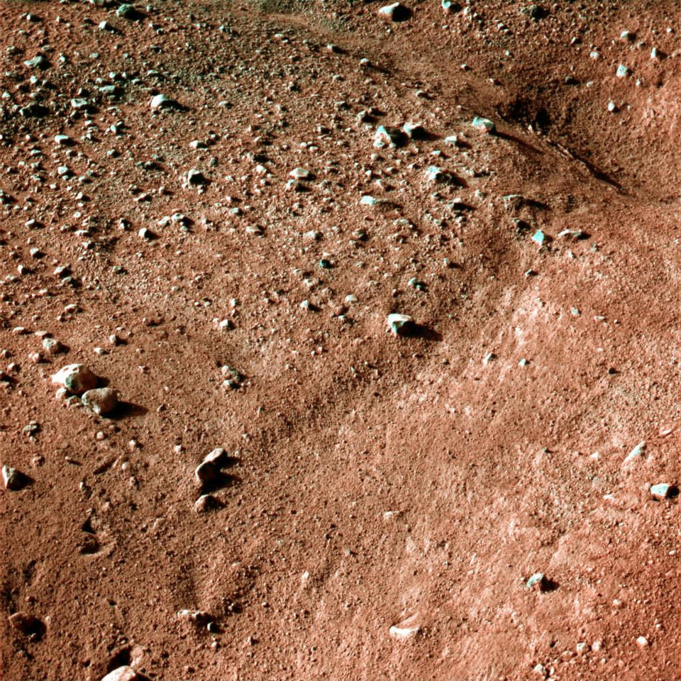 One of the first color images from the Phoenix Mars Lander shows the surface of Mars after the Phoenix Mars Lander spacecraft landed successfully in the first-ever touchdown near Mars' north pole May 25, 2008. REUTERS/NASA,JPL, Caltech, University of Arizona/Handout. FOR EDITORIAL USE ONLY. NOT FOR SALE FOR MARKETING OR ADVERTISING CAMPAIGNS.