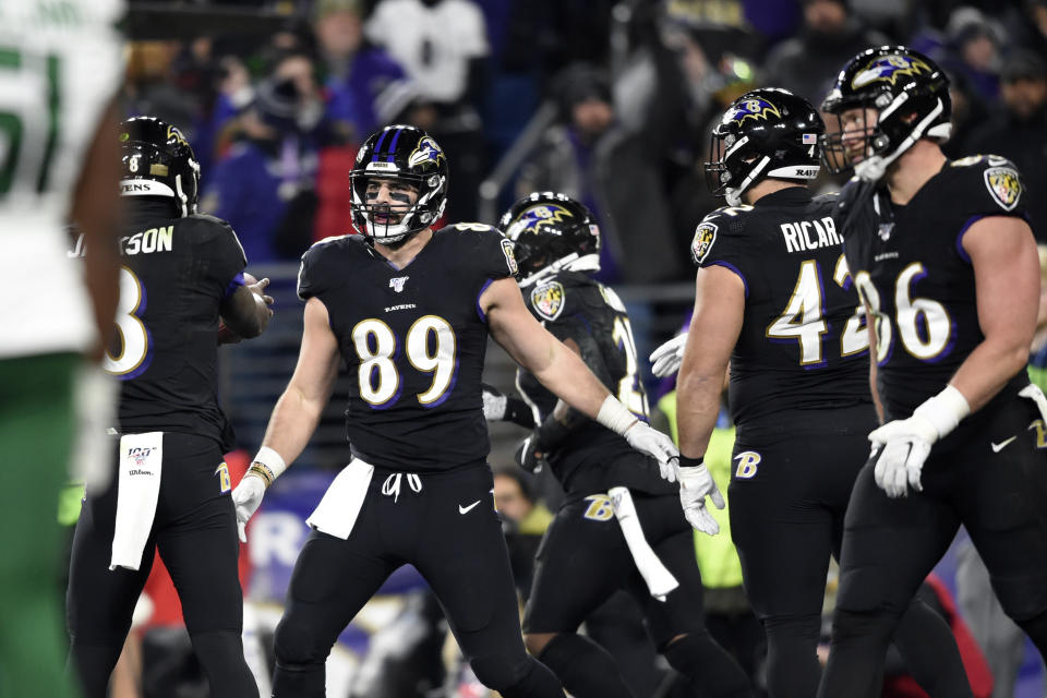 Baltimore Ravens tight end Mark Andrews (89) celebrates with quarterback Lamar Jackson (8) after they connected for a touchdown pass during the first half of an NFL football game against the New York Jets, Thursday, Dec. 12, 2019, in Baltimore. (AP Photo/Gail Burton)