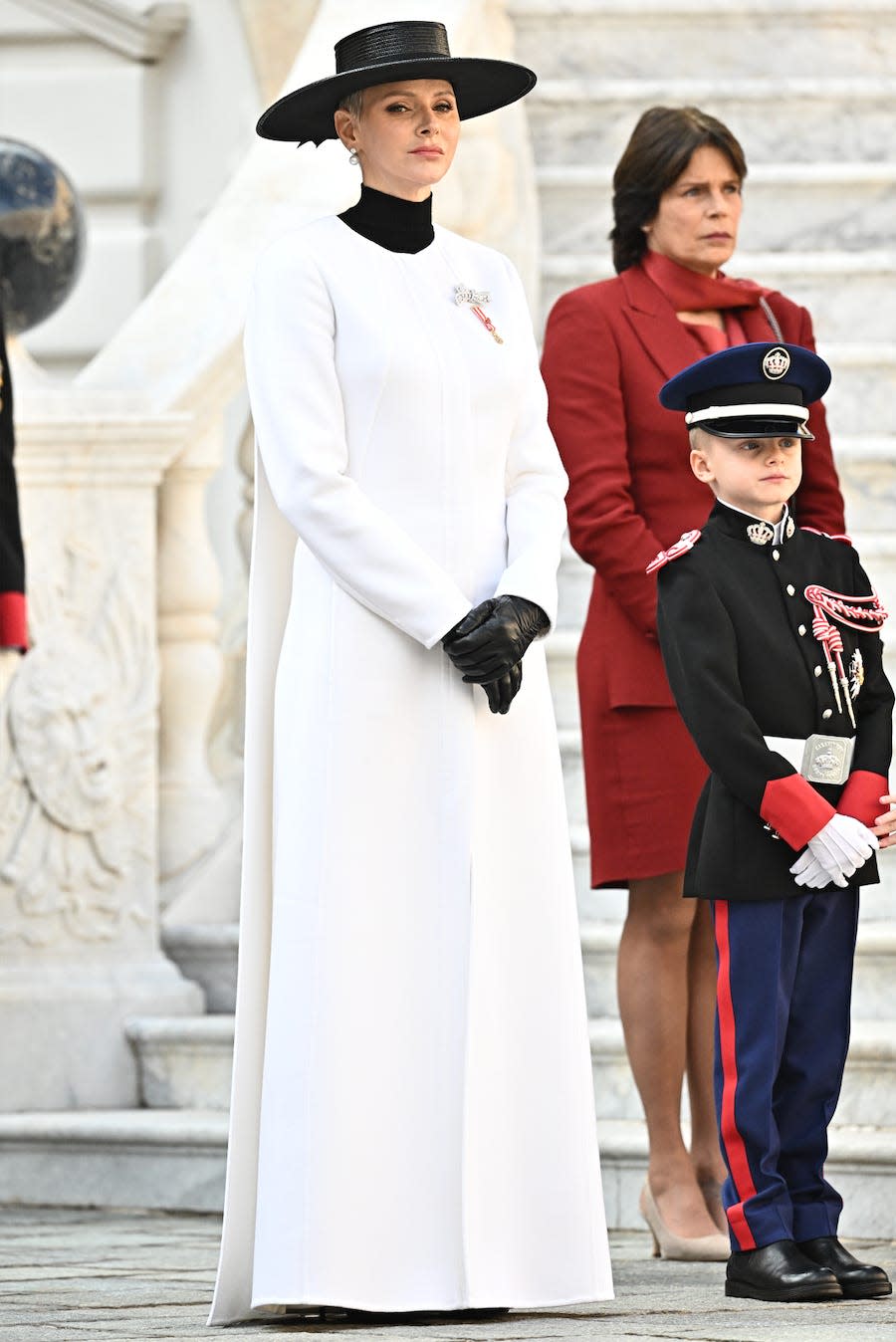 Princess Charlene of Monaco, Princess Stephanie, and Prince Jacques attend the Monaco National Day on November 19, 2022.