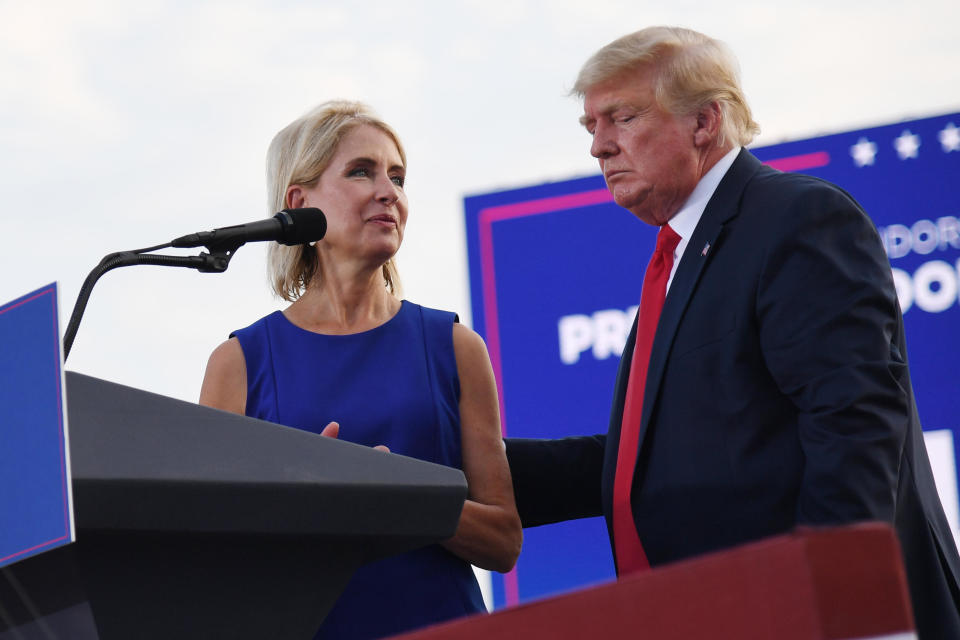 U.S. Rep. Mary Miller, a Republican from Illinois, is welcomed to the stage by former President Trump during a rally at the Adams County Fairgrounds on June 25, 2022, in Mendon, Illinois. / Credit: Michael B. Thomas/Getty Images