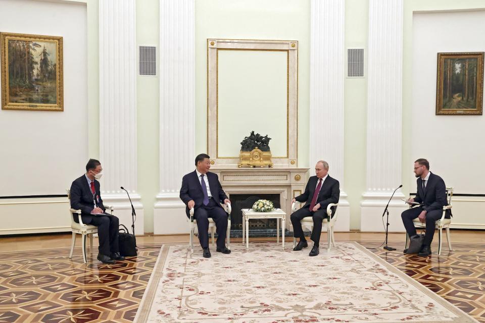 Chinese President Xi Jinping and Russian President Vladimir Putin talk during their meeting at the Kremlin in Moscow, Russia, Monday, March 20, 2023. (Sergei Karpukhin, Sputnik, Kremlin Pool Photo via AP)