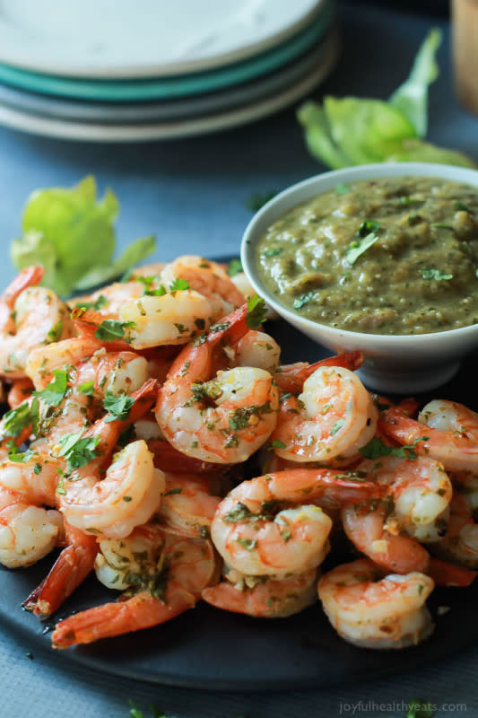 <p>Joyful Healthy Eats</p><p>Delicious, fresh, citrusy shrimp served with homemade tomatillo sauce. It's a great snack or a party appetizer. <a href="http://www.joyfulhealthyeats.com/cilantro-lime-roasted-shrimp-with-tomatillo-sauce/" rel="nofollow noopener" target="_blank" data-ylk="slk:Get the recipe HERE;elm:context_link;itc:0;sec:content-canvas" class="link rapid-noclick-resp">Get the recipe HERE</a>.</p>