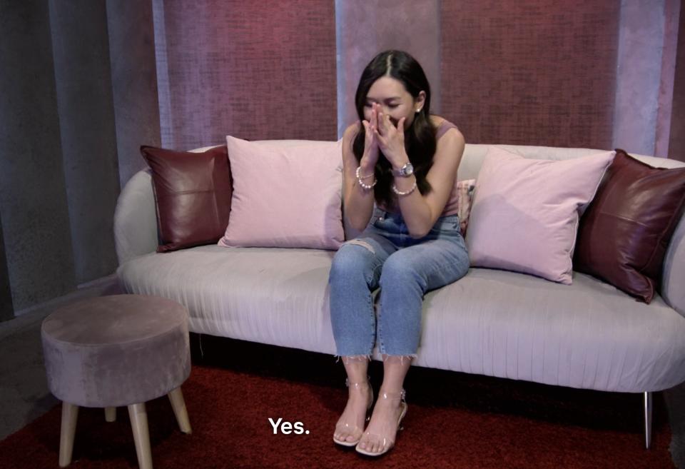 Natalie in her pod saying "yes" to Shayne's proposal