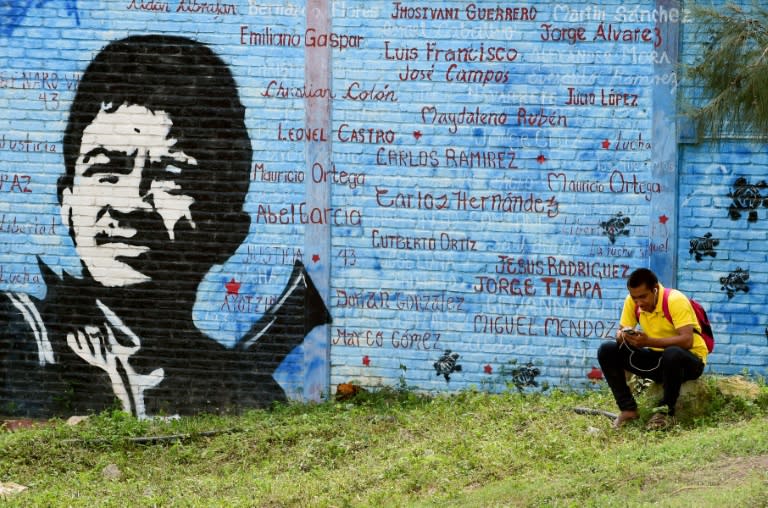 A student sits inside the compound of the Raul Isidro Burgos rural teaching college in Ayotzinapa, Mexico on September 21, 2016