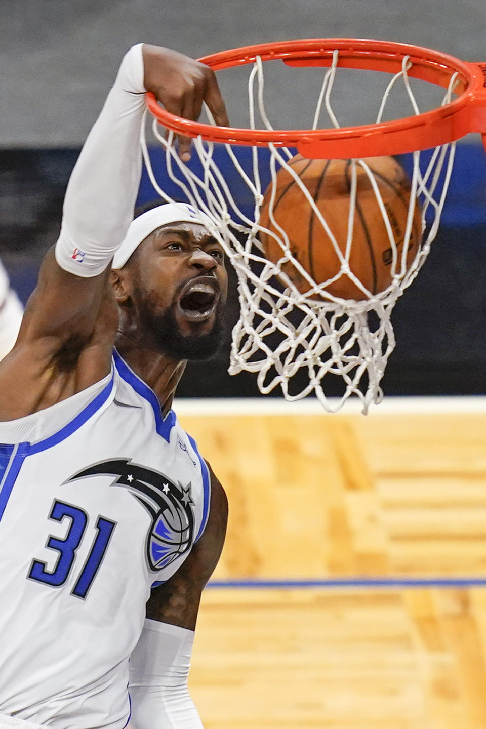 Orlando Magic guard Terrence Ross (31) slams the ball during the second half of an NBA basketball game against the Indiana Pacers, Friday, April 9, 2021, in Orlando, Fla. (AP Photo/John Raoux)