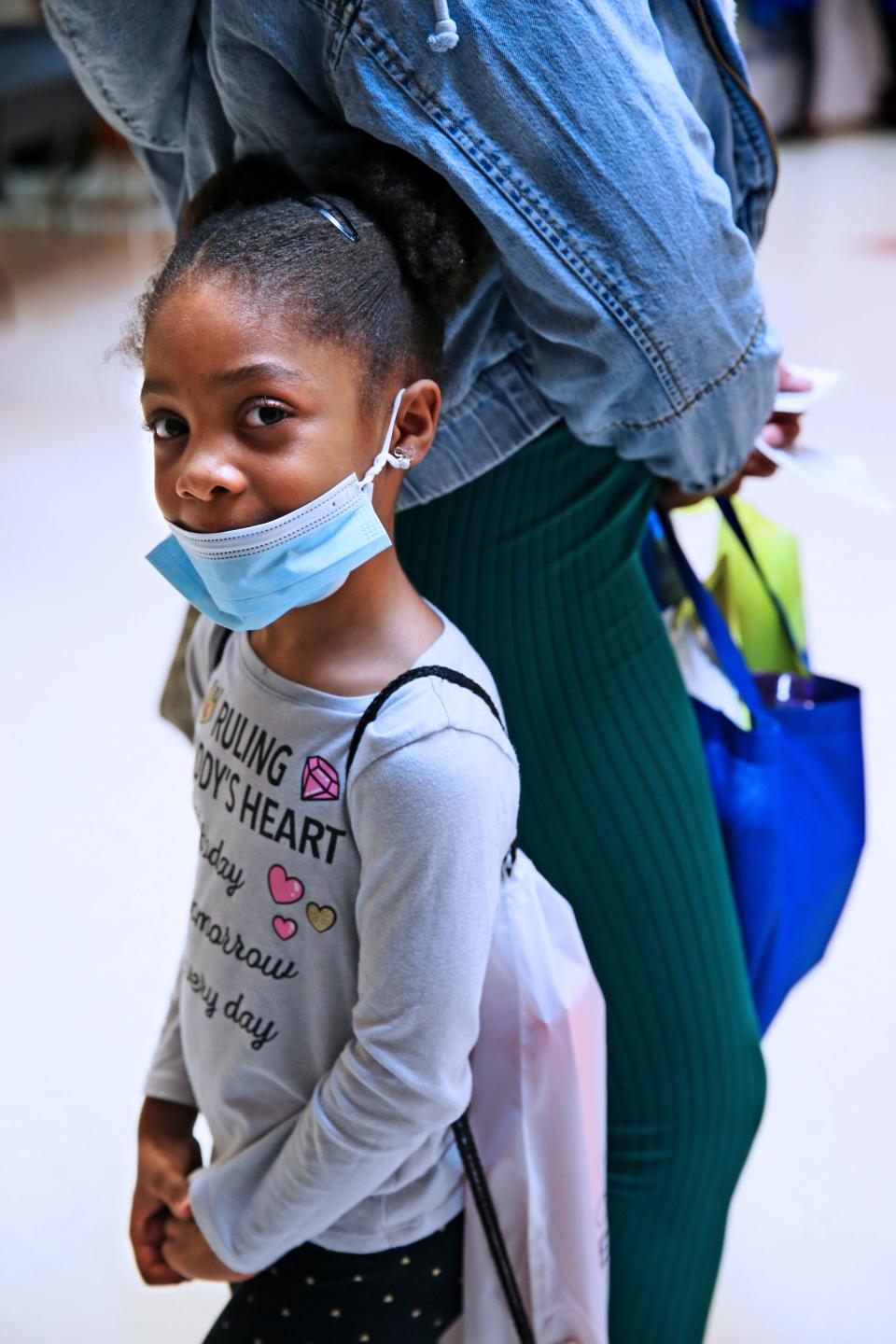 Samoria, 5, stays close by her mother Tyanna Wilder while attending the Blanket of Love baby shower April 22, 2022, at Ascension Ebenezer Health Resource Center. The Blanket of Love program was started in 2004.