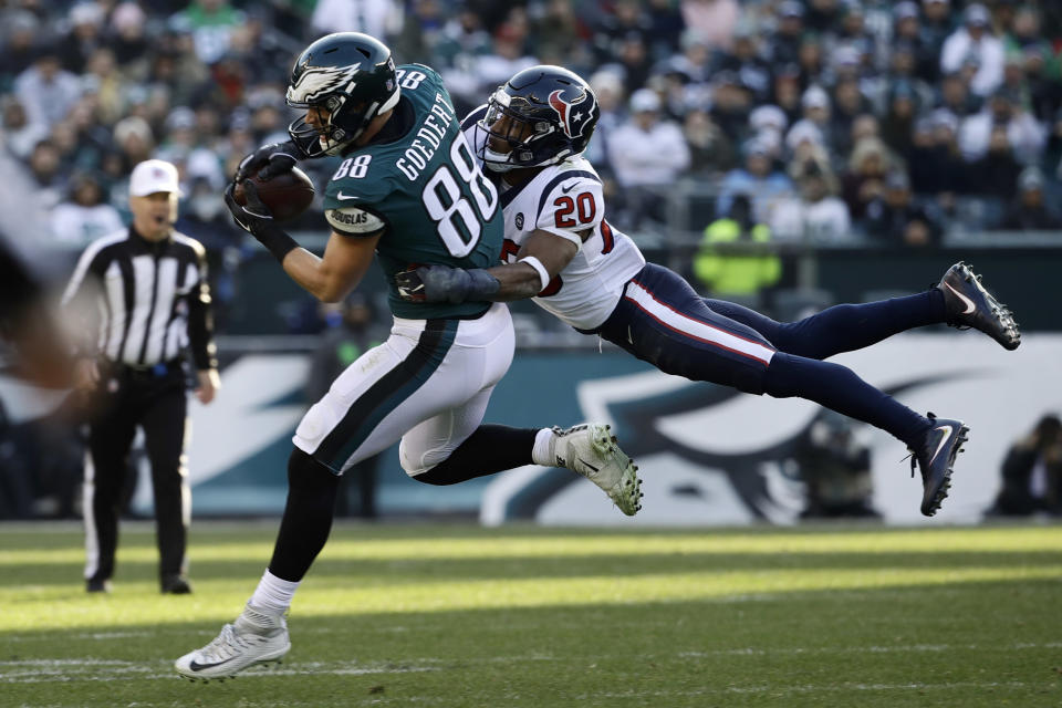 Philadelphia Eagles' Dallas Goedert (88) pulls in a pass against Houston Texans' Justin Reid (20) during the second half of an NFL football game, Sunday, Dec. 23, 2018, in Philadelphia. (AP Photo/Matt Rourke)