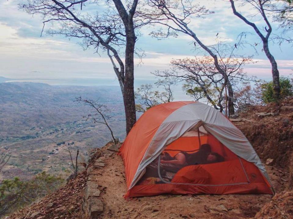 ‘We spent most of the week off the bikes at a really beautiful ecolodge in the mountains, camping right on the edge of a cliff. We woke up every morning to incredible sunrises over Lake Malawi, ate good food, and met some great people’ (Simply Cycling)