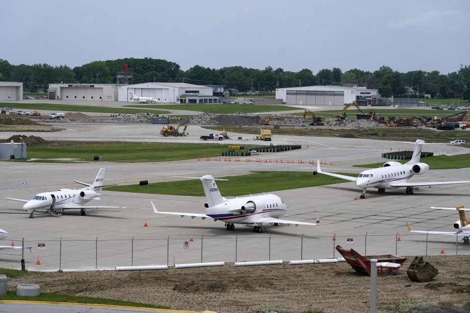 FILE - Planes sit on the tarmac at the Des Moines International Airport, Monday, June 13, 2022, in Des Moines, Iowa. With an eye on the upcoming July Fourth weekend, airlines are stepping up their criticism of federal officials over recent widespread flight delays and cancellations. The industry trade group Airlines for America said Friday, June 24, 2022, that understaffing at the Federal Aviation Administration is crippling traffic along the East Coast. (AP Photo/Charlie Neibergall, File)