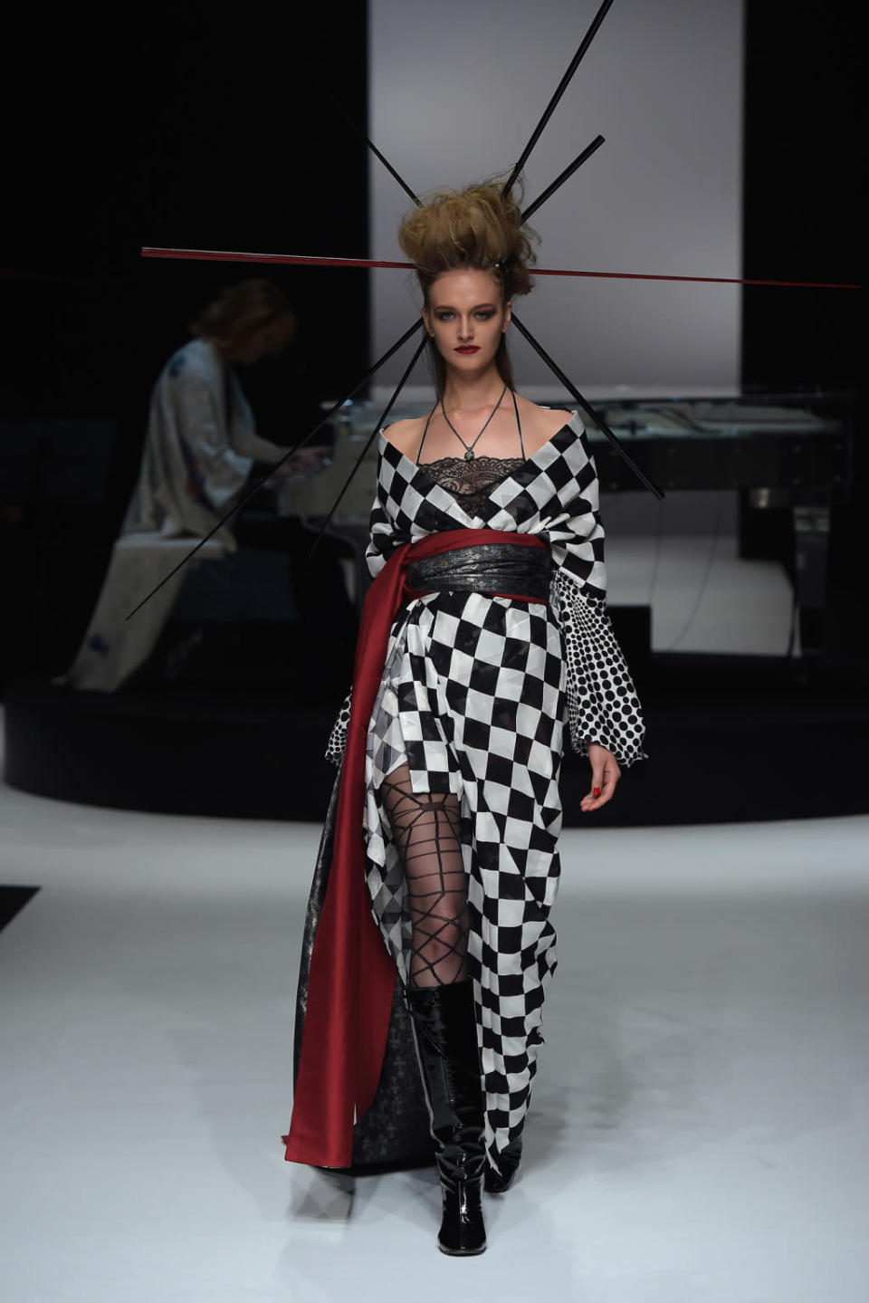 Sticks used as hair accessories on the Yoshikimono runway at Tokyo Fashion Week. 