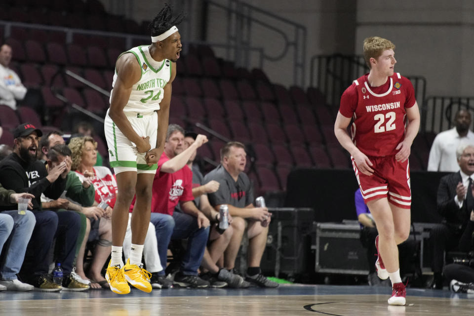 North Texas' Jayden Martinez (24) celebrates after scoring against Wisconsin during the second half of an NCAA college basketball game in the semifinals of the NIT, Tuesday, March 28, 2023, in Las Vegas. (AP Photo/John Locher)