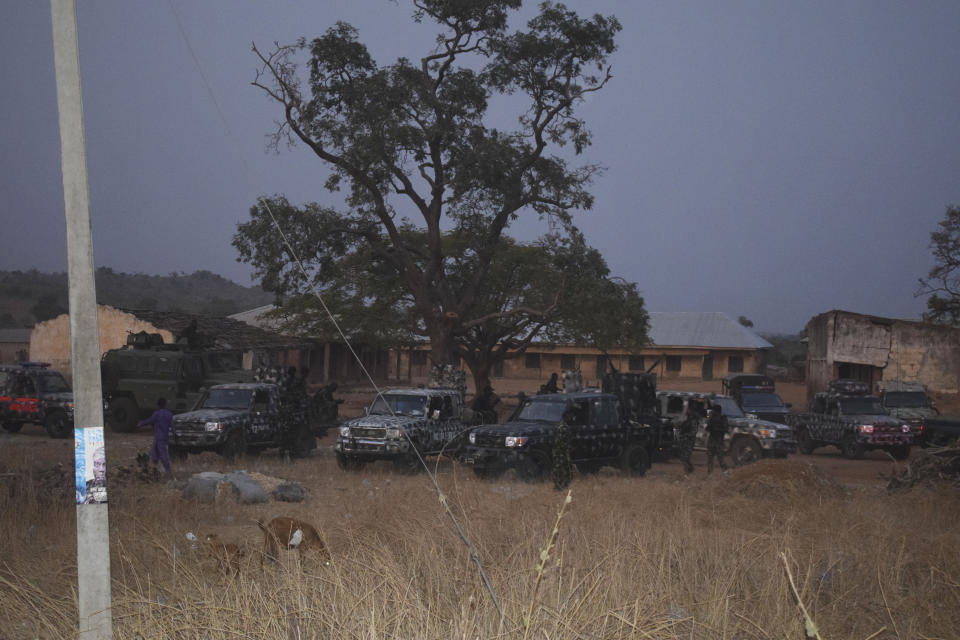 Nigeria Army trucks are parked at the School were children were kidnapped in Chikun, Nigeria, Thursday, March 7, 2024. Gunmen attacked a school in Nigeria's northwest region Thursday morning and abducted at least 287 students, the headteacher told authorities, marking the second mass abduction in the West African nation in less than a week. (AP Photo)