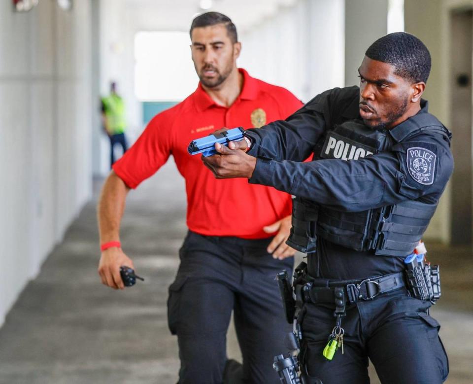 Miami-Dade Schools Police Department officers arrive on the scene during a large-scale active shooter drill at Miami Central Senior High in Miami, Florida on Thursday, July 18, 2024.