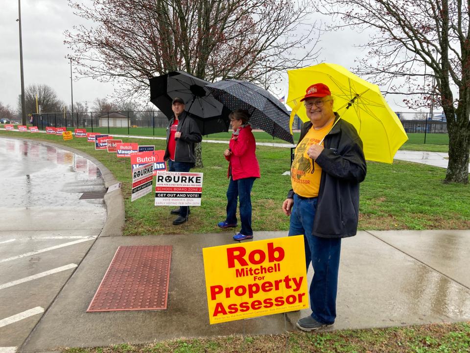 Rutherford County Property Assessor campaigns for reelection in the Republican primary outside the SportsCom polling center in Murfreesboro.