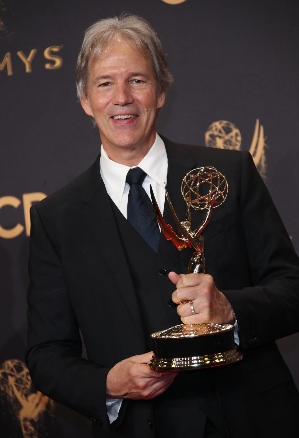 David E. Kelley poses with his Emmy Award for outstanding limited series for "Big Little Lies" in 2017.