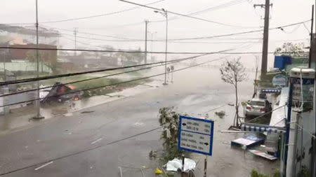 A storm batters a street in Nha Trang, as Typhoon Damrey descends on southern Vietnam, in this still image taken from social media video, November 4, 2017. @SINITSYN_NIKITA/via REUTERS