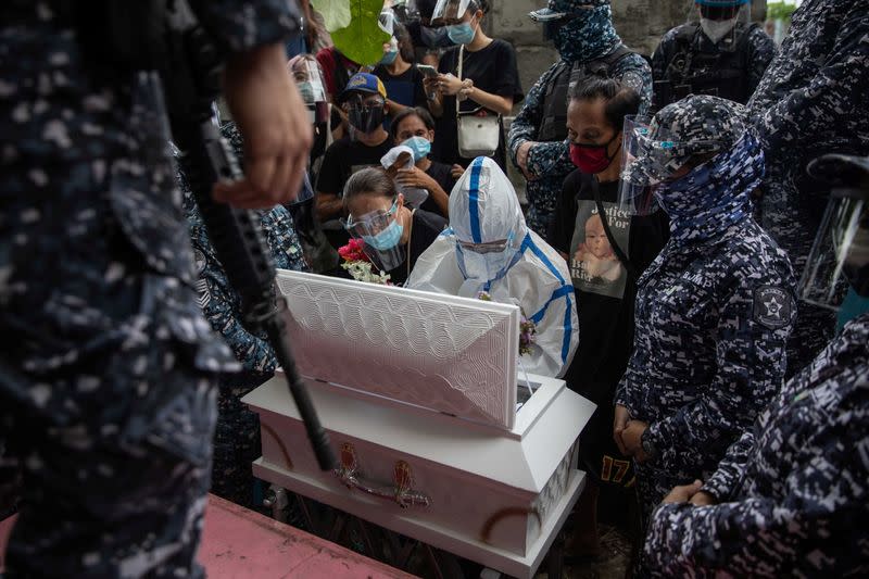 Burial of three-month-old baby separated from jailed mother