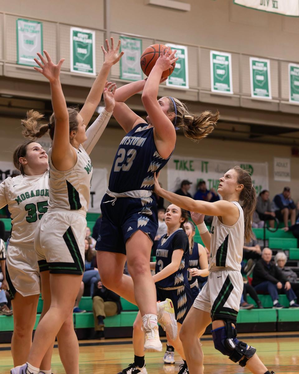 Rootstown center Brooklynn McIntyre puts up a shot during a high school basketball game against Mogadore, Wednesday, Feb. 7, 2024, in Mogadore, Ohio.