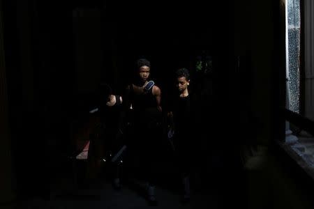 Students at the Cuba's National Ballet School (ENB) chat during a break in Havana, Cuba, October 12, 2016. Picture taken October 12, 2016. REUTERS/Alexandre Meneghini