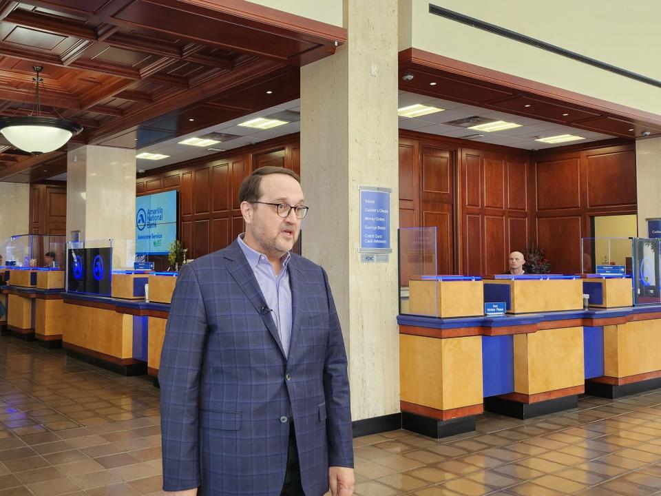 Amarillo Area Foundation (AAF) President and CEO Clay Stribling accepts Amarillo National Bank's $1 million donation benefiting the foundation's Panhandle Disaster Relief Fund, as announced Wednesday afternoon in the ANB tower main lobby. The bank is also working with the foundation to collect donations to go toward wildfire relief efforts.