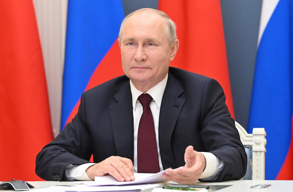 Russian President Vladimir Putin talks with Chinese President Xi Jinping, on the screen, via video conference in Moscow, Russia, Monday, June 28, 2021. (Alexei Nikolsky, Sputnik, Kremlin Pool Photo via AP)