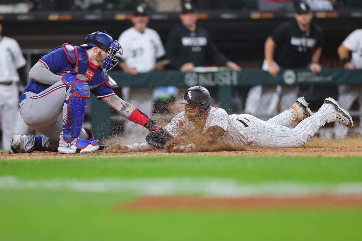 Rangers-White Sox controversial call: Why obstruction was called against Jonah  Heim, allowing Elvis Andrus to score