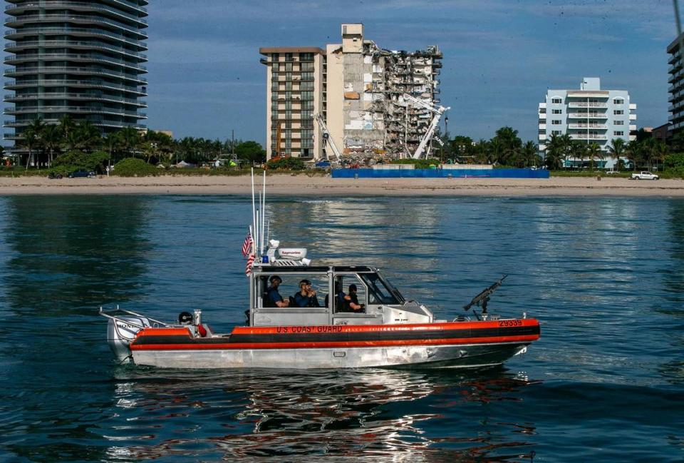 As Surfside prepares for U.S. President Joe Biden visit, Coast guard armed vessels are seen securing the area behind the 12-story oceanfront condo, Champlain Towers South, one week after the building collapsed, as rescue crews early Thursday stopped work amid concerns that the remaining structure could topple. on Thursday, July 01, 2021.