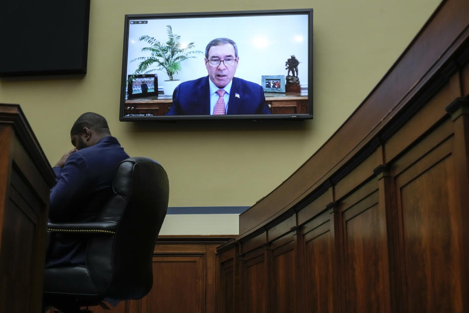 Christopher Killoy appears on a screen during his testimony.