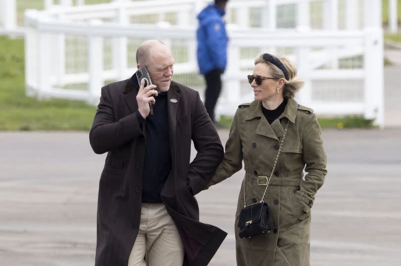 The pair looked cheerful and blissfully happy as they arrived in Cheltenham for the event