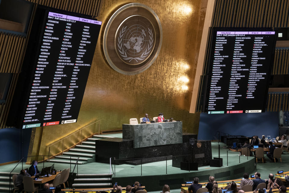 Voting commences on a resolution during a meeting of the United Nations General Assembly, Thursday, April 7, 2022, at United Nations headquarters. UN General Assembly approved a resolution suspending Russia from the world body's leading human rights organization. (AP Photo/John Minchillo)