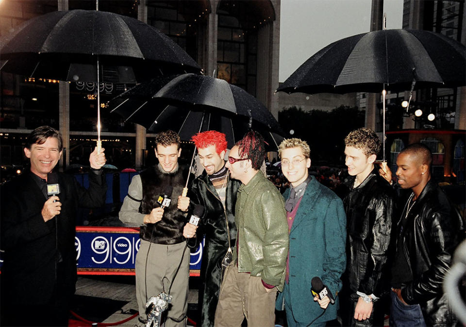 Kurt Loder and 'N Sync during 1999 MTV Music Awards Arrivals at Lincoln Center in New York City, New York, United States.