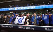 Oct 26, 2016; Cleveland, OH, USA; Chicago Cubs fans cheer after game two of the 2016 World Series against the Cleveland Indians at Progressive Field. Mandatory Credit: Charles LeClaire-USA TODAY Sports