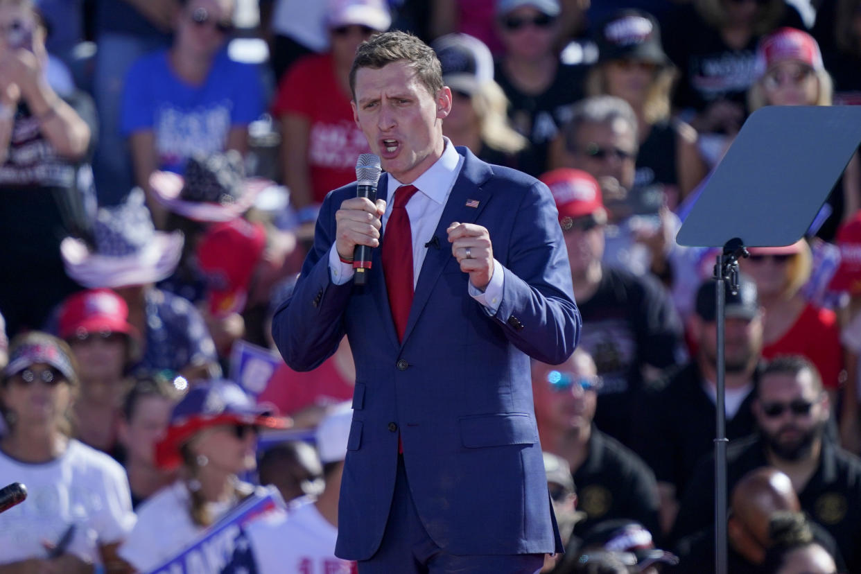 FILE - Senate Republican candidate Blake Masters speaks at a rally, Sunday, Oct. 9, 2022, in Mesa, Ariz. Masters lost his race against Democratic Sen. Mark Kelly. (AP Photo/Matt York, File)