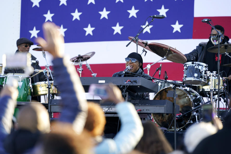 Stevie Wonder performs before Democratic presidential candidate former Vice President Joe Biden and former President Barack Obama speak at a rally at Belle Isle Casino in Detroit, Mich., Saturday, Oct. 31, 2020. (AP Photo/Andrew Harnik)