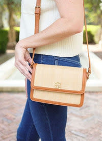 <p><a href="https://shopcarolinehill.com/collections/crossbody/products/reese-straw-crossbody-camel" rel="nofollow noopener" target="_blank" data-ylk="slk:Shop Now;elm:context_link;itc:0;sec:content-canvas" class="link rapid-noclick-resp">Shop Now</a></p><p>Reese Straw Crossbody </p><p>shopcarolinehill.com</p><p>$64.00</p>